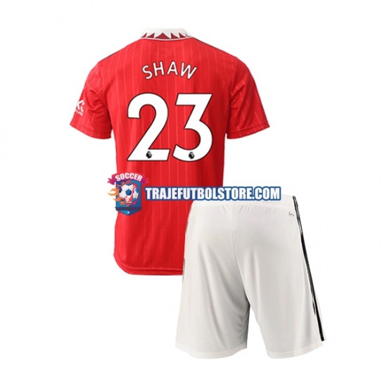 Camiseta 1ª Manchester United Luke Shaw 23 Niño 2022-2023 Manga Corta